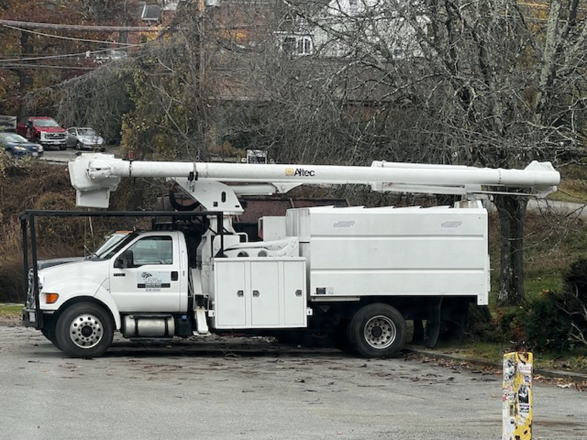 Altec aerial bucket truck used for safe roof soft washing access in Westchester NY
